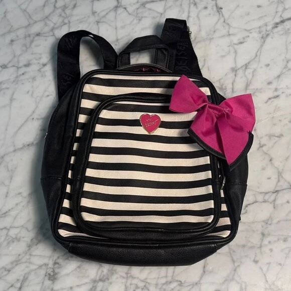 Betsey Johnson Handbags - Betsey Johnson Black & White Bow Faux Leather Striped Backpack